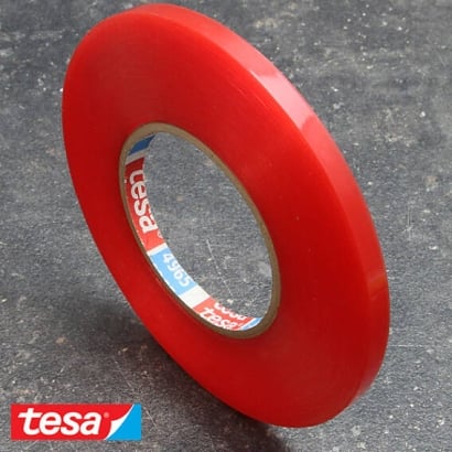 Tesa 4965, double-sided adhesive PET tape, very strong acrylic adhesive, red foil cover 9 mm