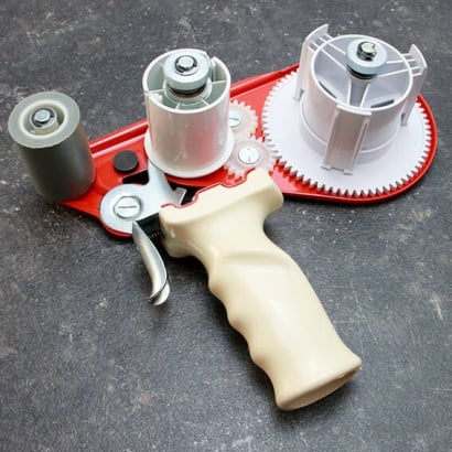 Hand dispenser for double-sided adhesive tissue tapes up to 50 mm roll width 
